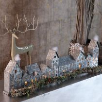 Artikel Dekorativ række af huse med fyrfadsstager, adventsdekoration, 68 cm
