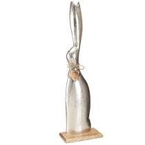 Artikel Dekorativ kanin sølv på træfod – Elegant påskefigur med hjertevedhæng H60cm