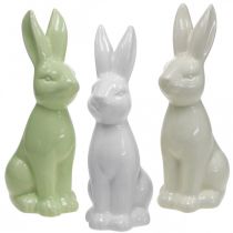 Artikel Porcelæn påskehare siddende hvid, creme, grøn H18cm 3stk