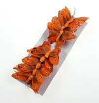 Artikel Dekorativ sommerfugl på wiren orange 8 cm 12stk