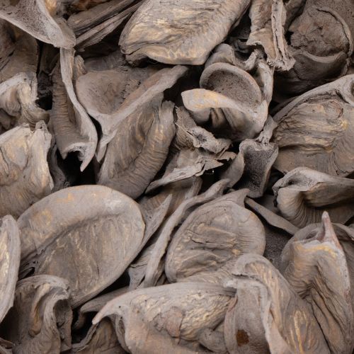 Artikel Potpourri borddekoration med nødder for en naturlig sommerstemning