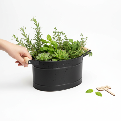 Artikel Oval metalpotte med håndtag, sort og naturlig finish, 34x19,5x15 cm