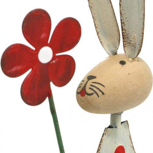 Artikel Påskedekoration, kanin af metal, forårsdekoration, påskehare med blomsterrød, beige H21cm 2 stk.