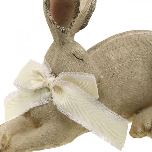 Floristik24 Påskehare liggende med sløjfe Polyresin påskepynt 28cm