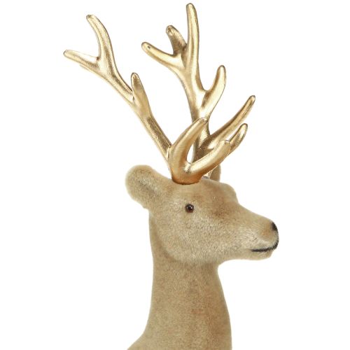 Artikel Siddende hjortedekoration floket lysebrun 15×6×15,5 cm